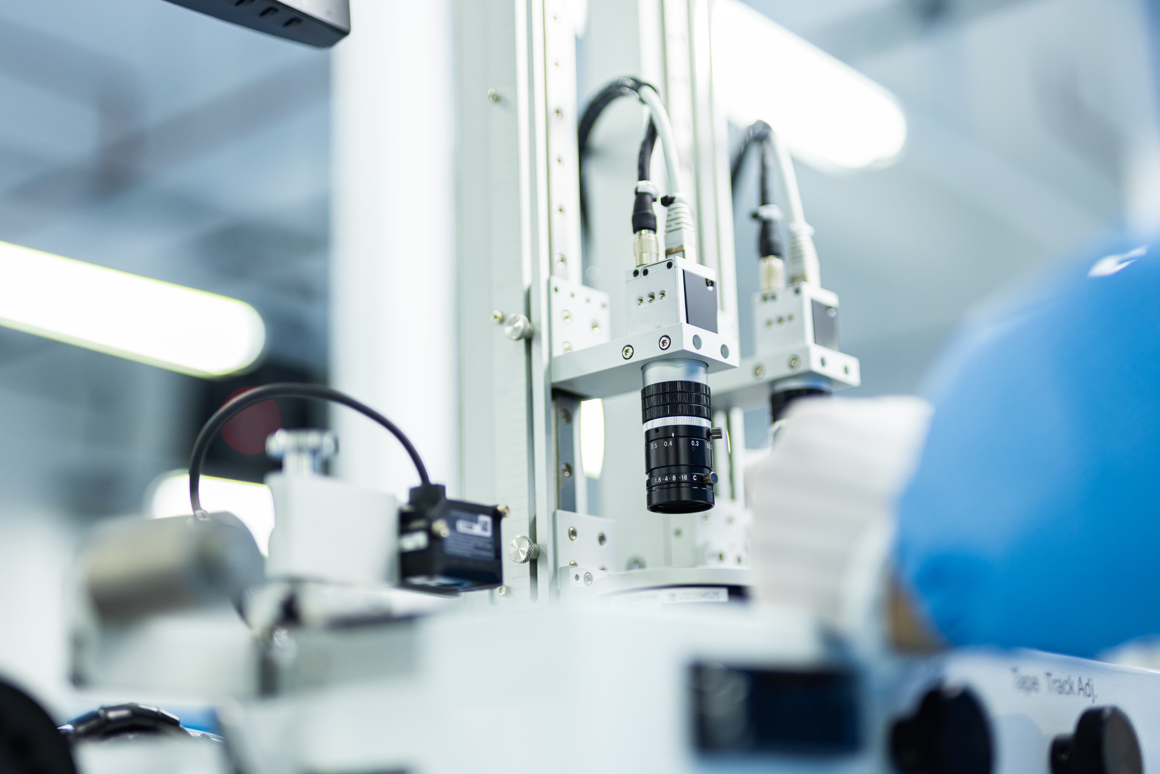 Closeup of a microscope at a Fusion Worldwide quality testing center
