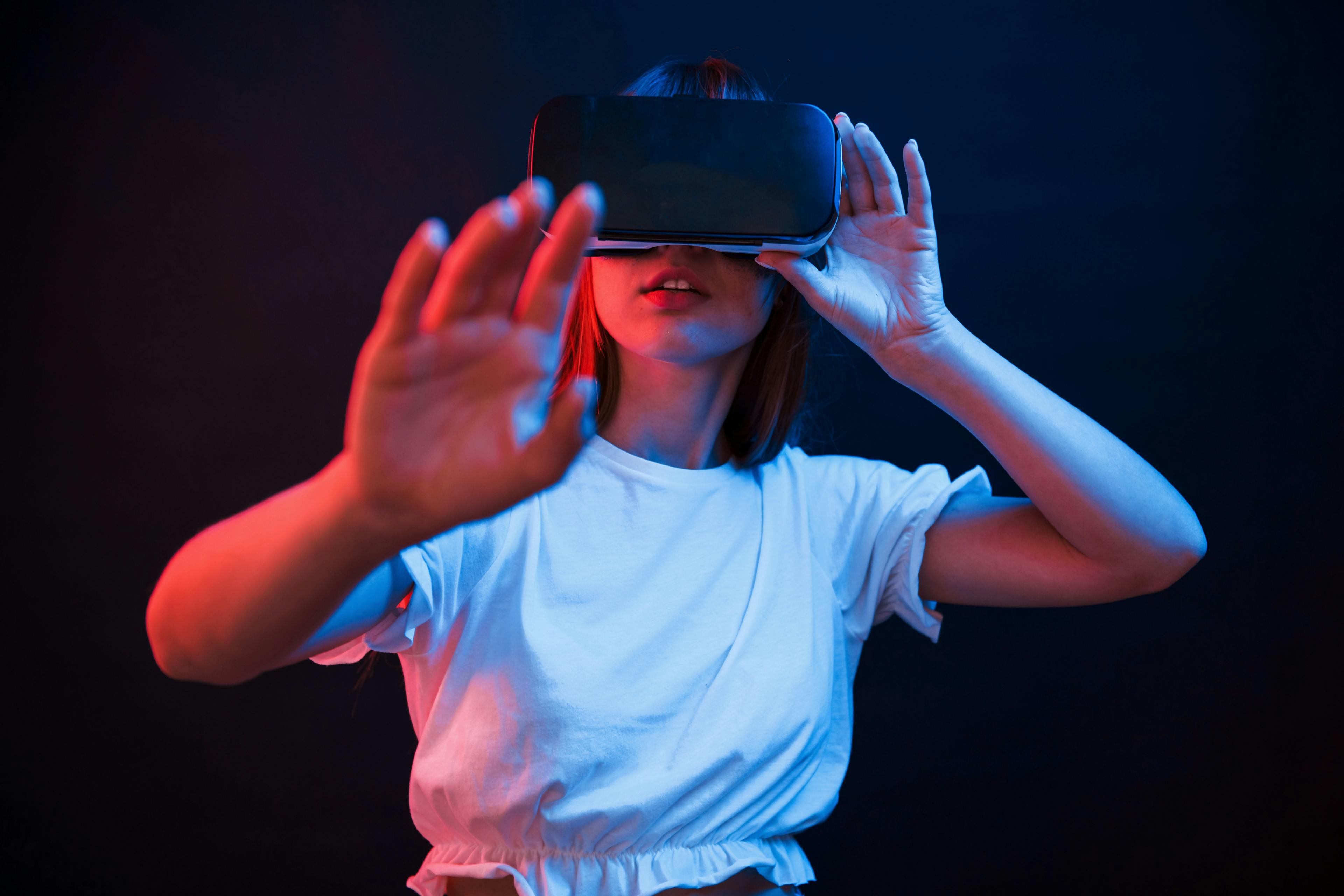 A person using a VR headset with their hands outstretched